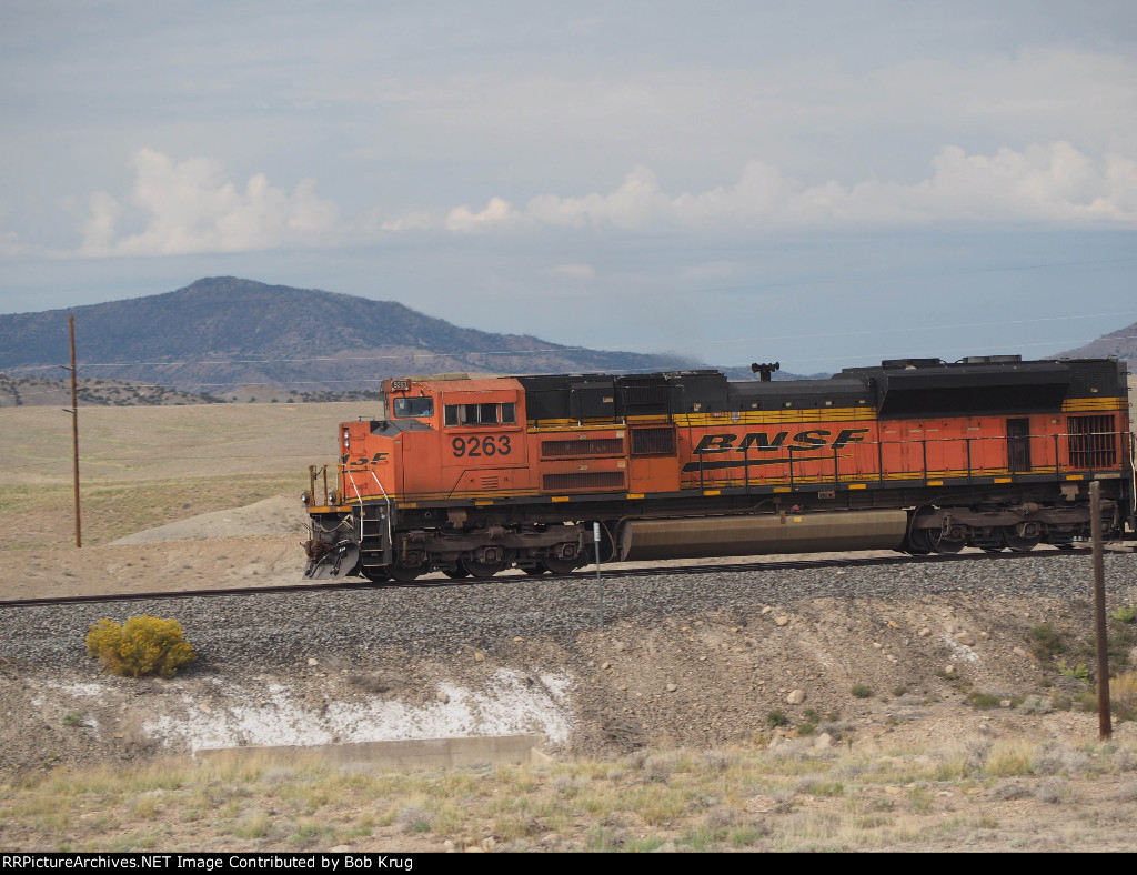 Pusher service:  BNSF 9263 was shoving on the rear of the oil train 